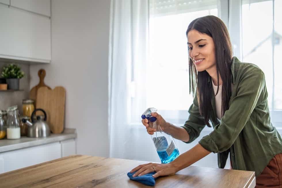 Cleaner wiping surfaces during daily cleaning routine